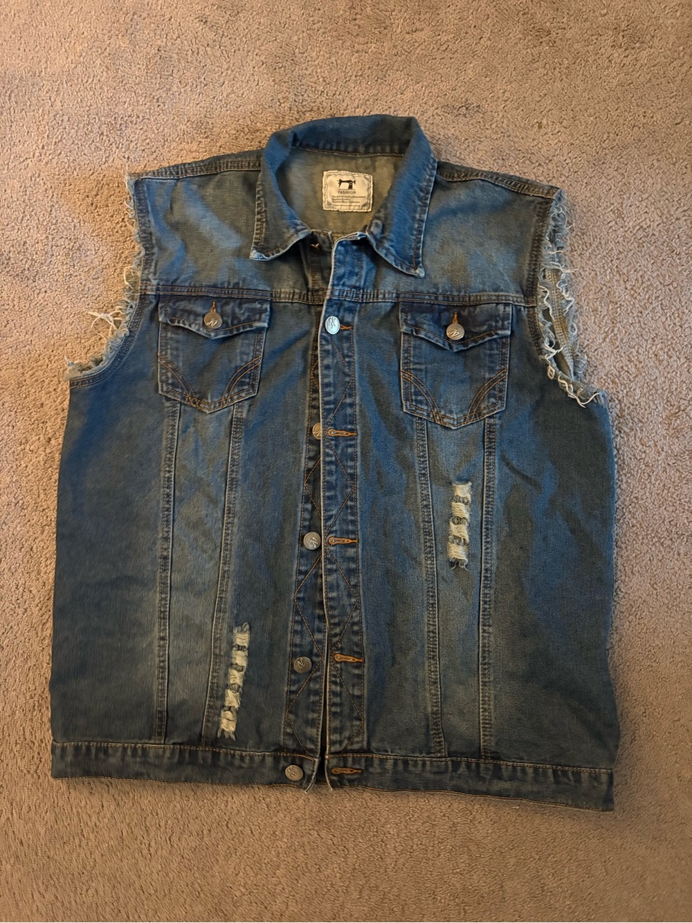 Sleeveless Distressed Denim Vest in Blue